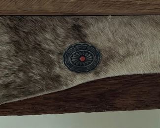 Desk with hair-on-hide paneled apron. Measures 35.5" W x 23.25" D x 28.5". Photo 3 of 6.