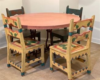 Southwestern-style 48" R pedestal dining table with stone top and wrought iron base. Photo 1 of 2.