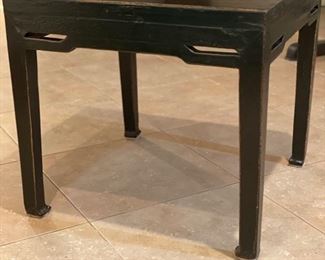 Asian reproduction ebony side table - 2 available. Each measures 33" W x 23" D x 27.5" H. Photo 1 of 3.