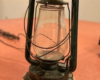 Antique lantern fashioned into a lamp. Photo 2 of 4.
