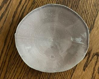 Ceramic Plate signed by artist. Photo 1 of 2.