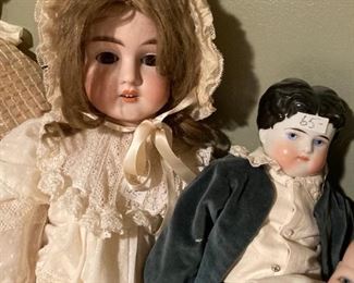 . . . more vintage dolls (German on right)