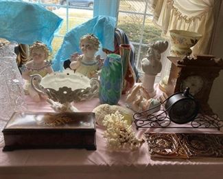 . . . pottery, piano babies, a clock, and a music box