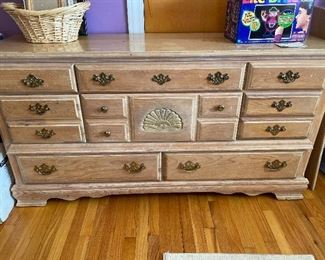 Dresser with a triple mirror