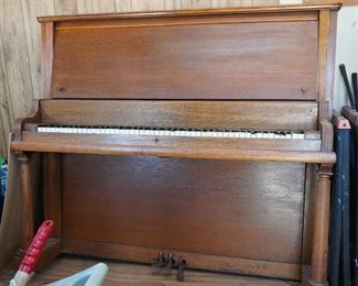 Oak upright piano