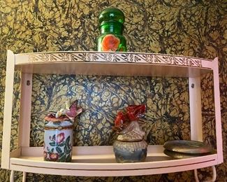 Vintage pink metal shelf.