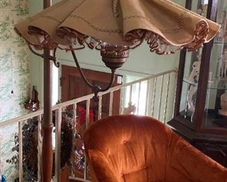 Pole floor to ceiling lamp.