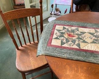 Dining room table with six chairs.