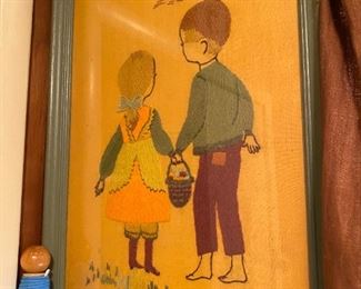 Framed needlework.