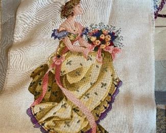 Unframed needlework.