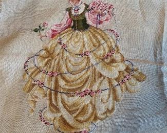 Unframed needlework.