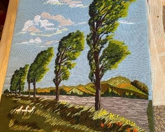 Unframed needlework.