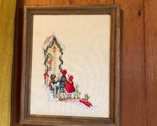 Framed needlework.