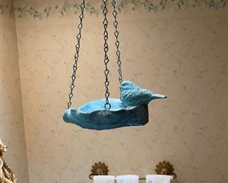 Hanging bird bath.