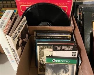 Cassettes, VHS, 8-tracks, record albums, and 45s.