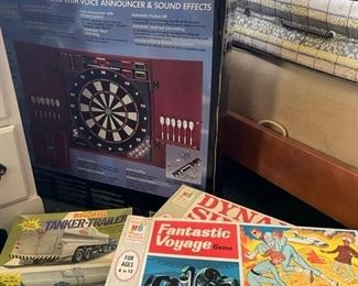 Board games and dartboard.