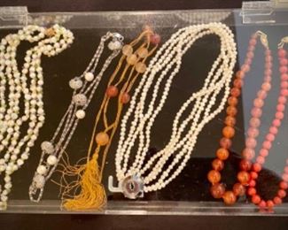 Jewelry - necklaces, bracelets, rings - pearls, carnelian, amber, semi-precious stones