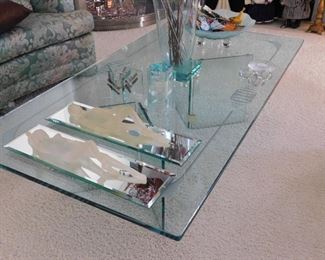 Gorgeous etched coffee table with 1/2 inch glass top. 90 degree glass supports underneath.