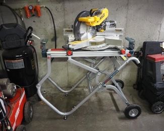 DeWalt 12" Compound Electric Miter Saw, Model DWS780, On Bosch T4B Gravity Rise 2-Wheeled Collapsible Table