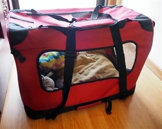 Canvas Pet Carrier, Snuggle Puppy Chew Toys, Retractable Leashes, Poo Bags, Dog Books And More