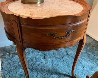 Another round end table with marble insert