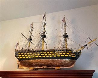 This British Ship has small copper pieces that are painstakingly applied to the bottom. 38”Hx48”Lx8”W $600