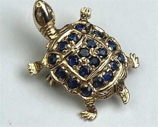For your consideration is this 14K Yellow Gold & Blue Sapphire Turtle Pin.  Marked and tested.  Attractive piece!  Weighs approx. 1.9 grams.