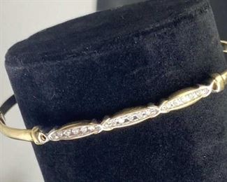 For your consideration is this 10K Yellow Gold w/ 15 Diamonds Cuff Bracelet.  Nice piece!  Marked and tested.  Weighs approx. 5.6 grams.