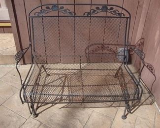 Wrought iron glider bench