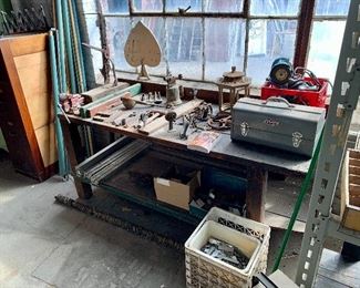 Old wooden work bench and tools