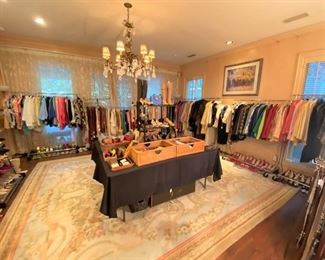 Clothing Room - You can’t believe the things in this room!  There are so many clothes, shoes and accessories, we had to remove all the furniture from the primary bedroom!