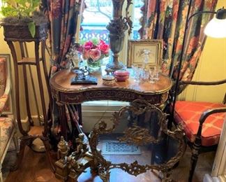 French Kidney desk with gilt bronze mounts; antique French fire screen; pair of exquisite French chenet