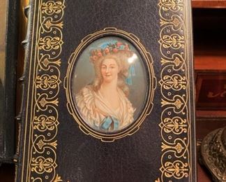 Antique leatherbound book with original portrait