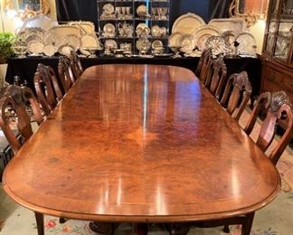 Antique burled Dining Room Table.  Size:  9’7” x 4’ with (2) leaves.  Leaves measure 22” each.  Brass Connectors