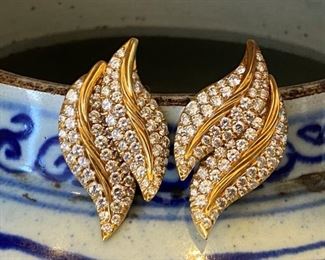 18k & diamond leaf earrings.  Who doesn’t need a gold and diamond earring that is heavy, clips and feels amazing.  Definitely a confidence builder at your next soirée!