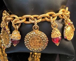 Charm bracelet - not for the faint of heart!  You’ll love this “Dallas” style charm bracelet!  In Dallas our big hair makes us “closer to God”.  If you can’t do that..you must wear this bracelet for “Godly” strength!