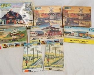 1084 LOT OF ATLAS MODEL TRAIN ACCESSORIES LOT INCLUDES 6 HO GAUGE PLUS TWO N GAUGE TELEPHONE POLE KITS
