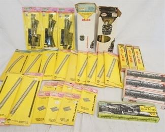 1224 LARGE LOT OF ATLAS HO GAUGE MODEL TRAIN TRACKS, LOT ALSO INCLUDES 4 ATLAS TRUSS BRIDGES.
