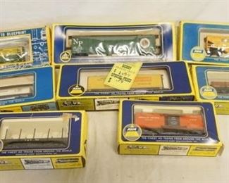 1313	LOT OF 8 AHM HO GAUGE MODEL TRAINS
