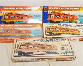 1321	5 LIFE LIKE BI LEVEL AUTO CARRIER MODELS, TWO OF WHICH ARE SEALED IN BOX

