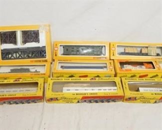 1332	LOT OF HO GAUGE MODEL TRAINS LOT INCLUDES FIVE COX MODELS & A BRIDGE & TRESTLE SET, & THREE O.K. STREMLINE PASSENGER CAR KITS
