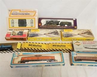 1334	MODEL TRAIN LOT HO GAUGE MODEL TRAINS, & ACCESSORIES. LOT INCLUDES PMI, HOBBYLINE, PROTO 2000 SERIES, & IHC 
