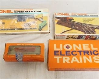 1343	LOT OF LIONEL TRAINS/ACCESSORIES INCLUDES MANUAL SWITCHES, REMOTE CONTROL SWITCH, O & O 27 GAUGE MODEL & HO BY LIONEL MISSILE LAUNCHING CAR
