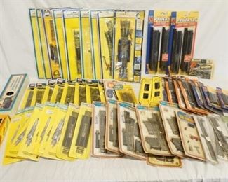 1351	LARGE LOT OF MODEL TRAIN ACCESSORIES INCLUDES ATLAS, LIFE LIKE, MODEL POWER & AHM
