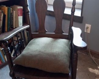 Vintage wooden rocker with cushion
