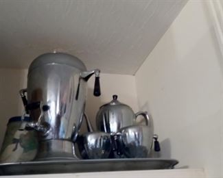 Coffee urn, tea pot, and sugar and cream set