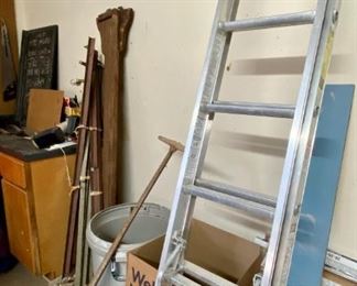 LAdder and push lawn mower