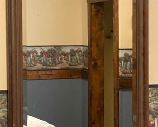 Beveled and framed mirror