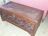 Fully relief carved camphor wood trunk, carved on all sides.