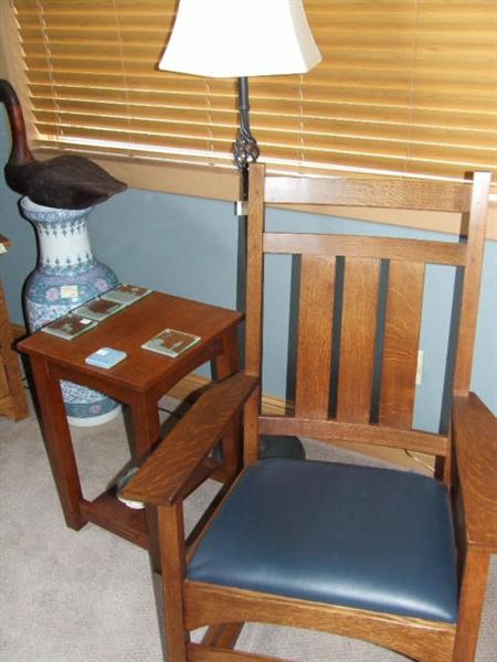 L. & J.G. Stickley rocker & side stand. 3 foor oriental floor vase